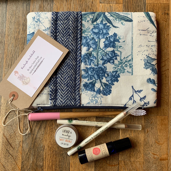 Hand sewn cosmetics and toiletry clutch bag