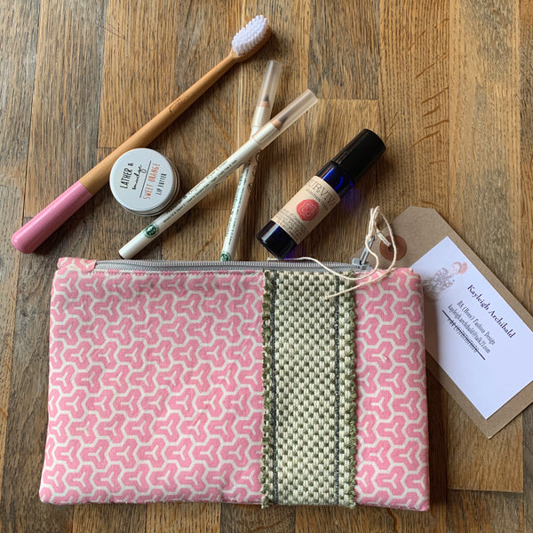 Hand sewn cosmetics and toiletry clutch bag