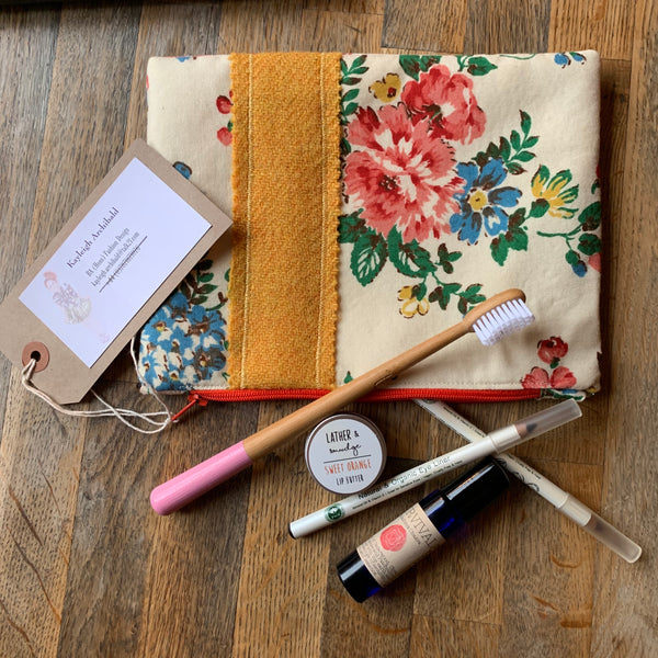 Hand sewn cosmetics and toiletry clutch bag