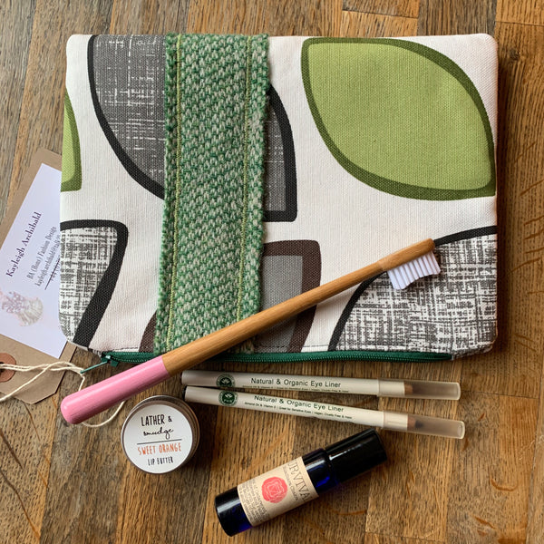 Hand sewn cosmetics and toiletry clutch bag