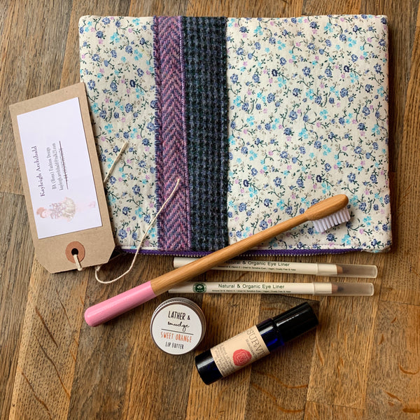 Hand sewn cosmetics and toiletry clutch bag